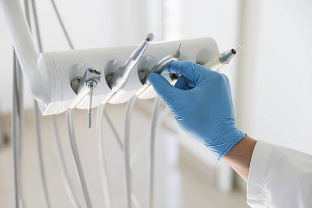 Professional Tooth Extraction technician working in Landis, NC